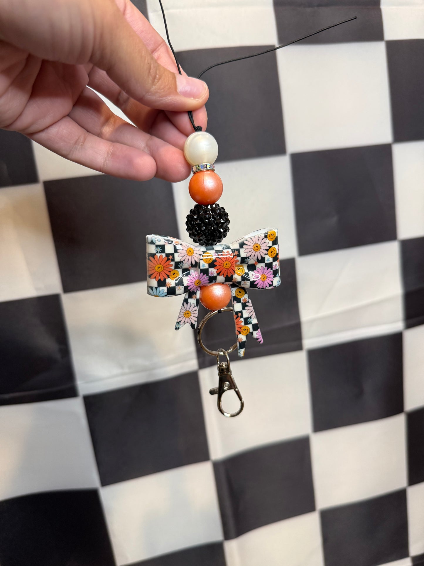 Checkered Happy Face Car Charm