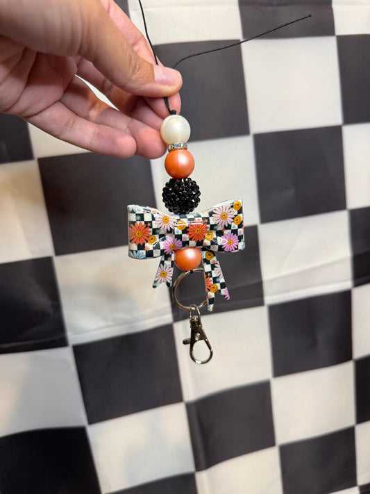 Checkered Happy Face Car Charm