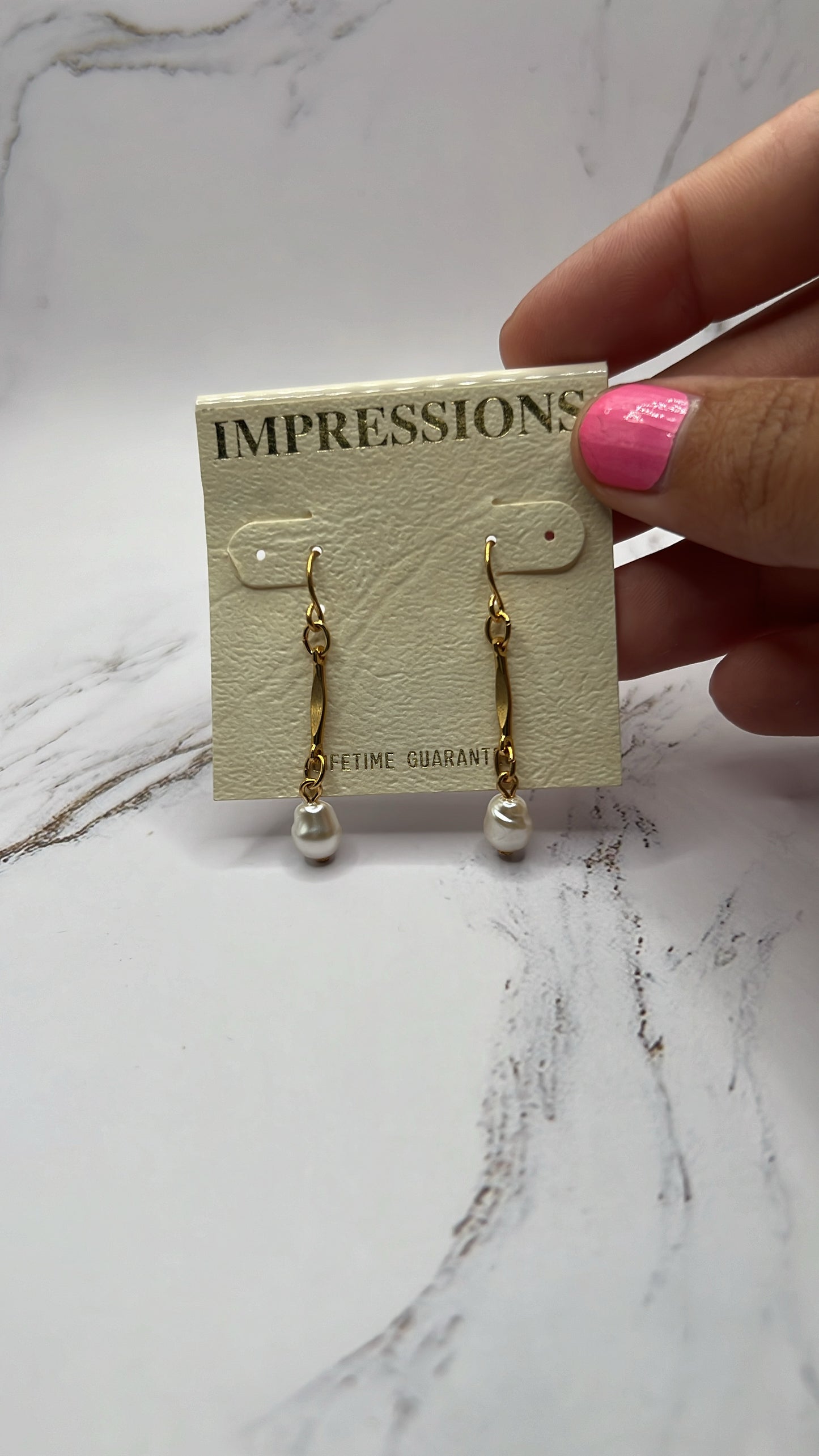 Pearl Earrings Impressions